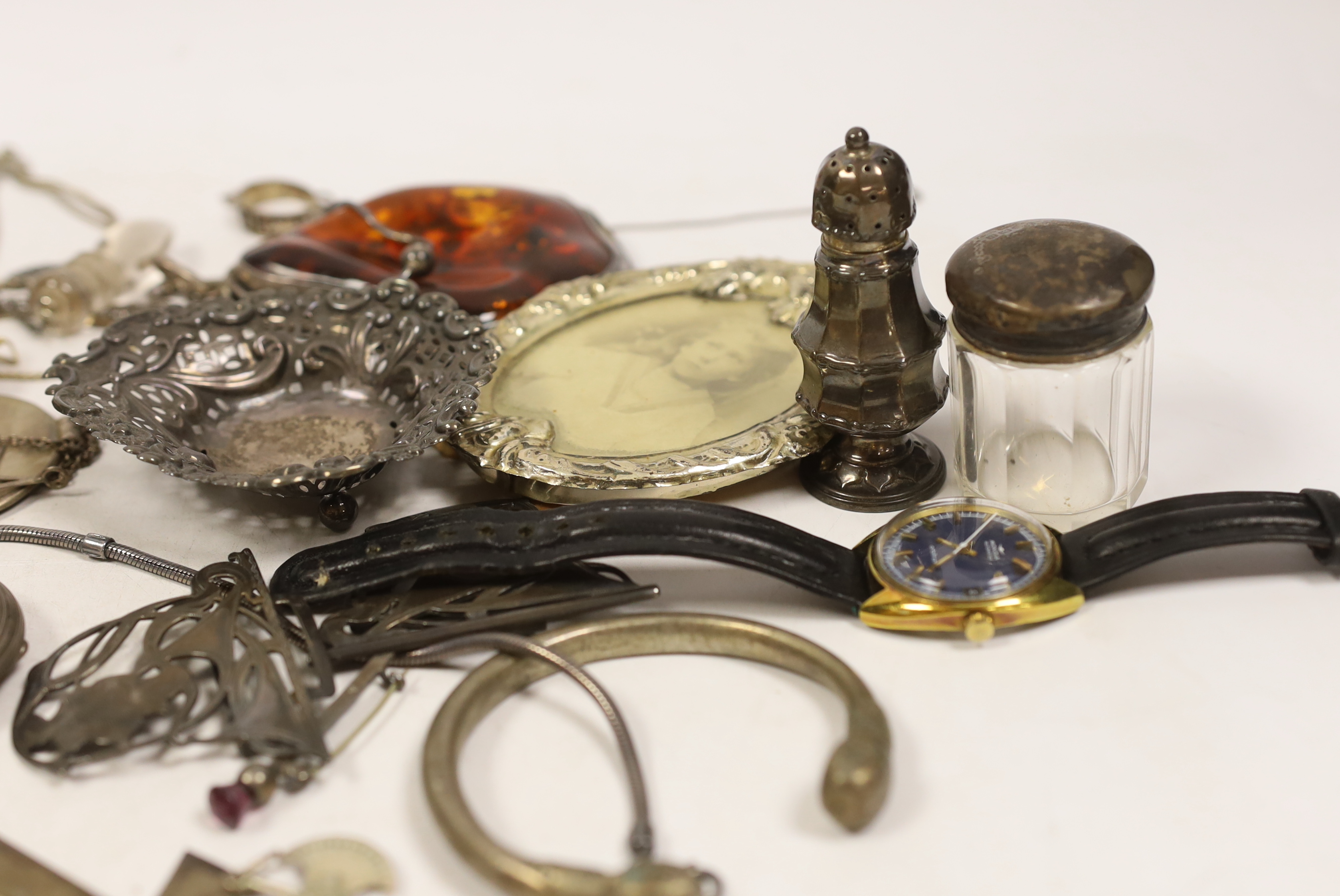 Miscellaneous silver including cigarette case, pepperette, bonbon dish, vesta case and belt buckle, a wrist watch and pocket watch and assorted jewellery including a large sterling mounted amber pendant and a Charles Hor